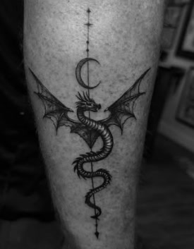 Black and grey celestial dragon tattoo